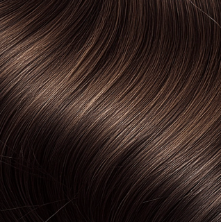 Dark Brown hair, typical of Soft Summer coloring